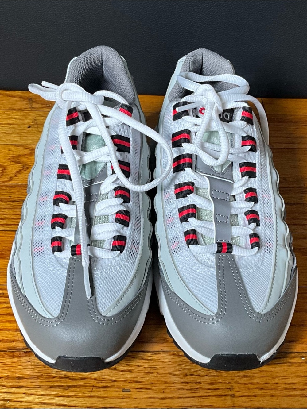 Nike Kids White, Gray and Black Sneakers with Red Accents